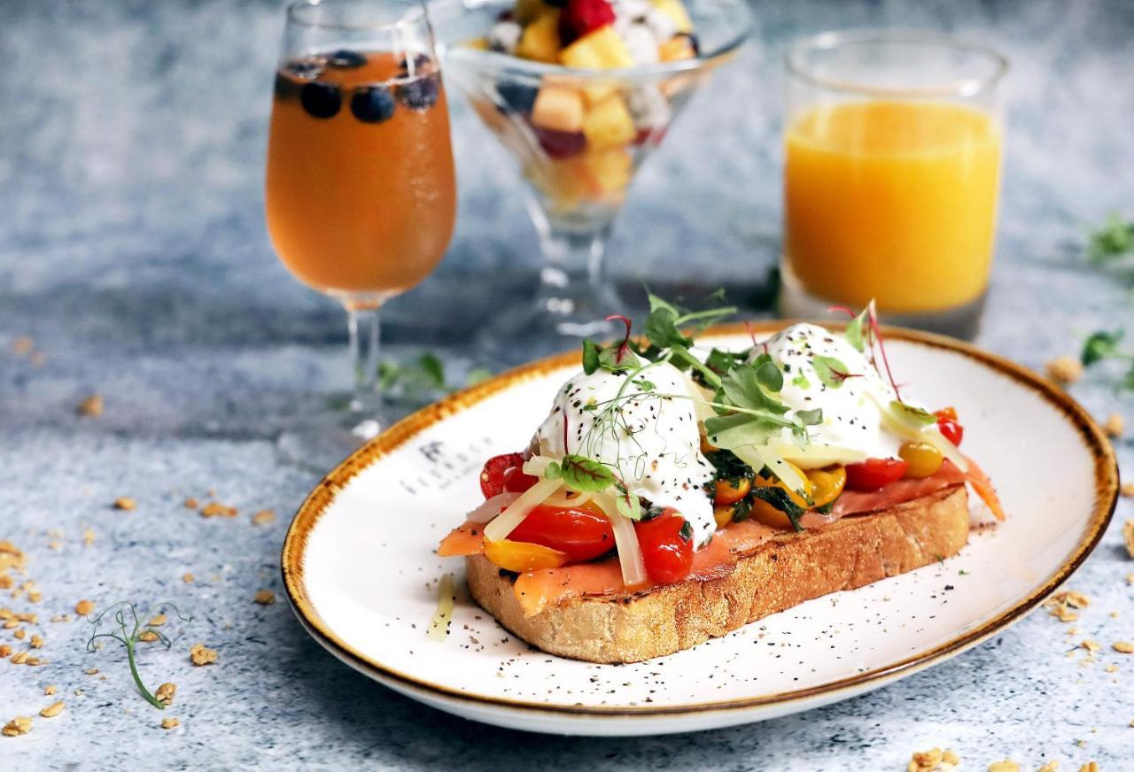 Oasia Resort Sentosa By Far East Hospitality Singapore Buitenkant foto Poached eggs on toast